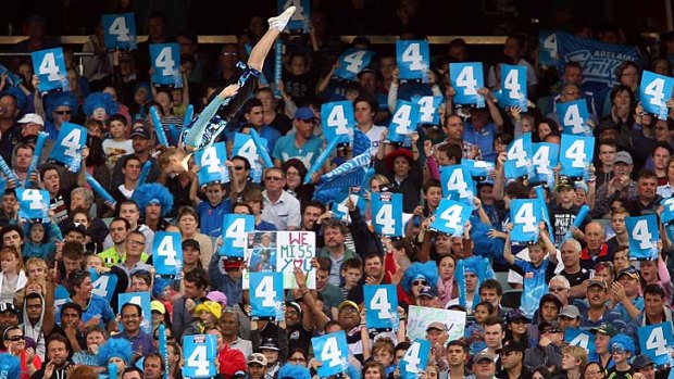 Spectators enjoy the atmosphere during the Big Bash League match between the Adelaide Strikers and the Sydney Sixers on Sunday.