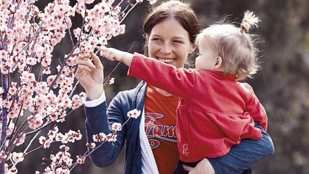 Into the light … for Lori Dwyer (with her daughter, Daisy), the online community means there’s always someone to talk to.