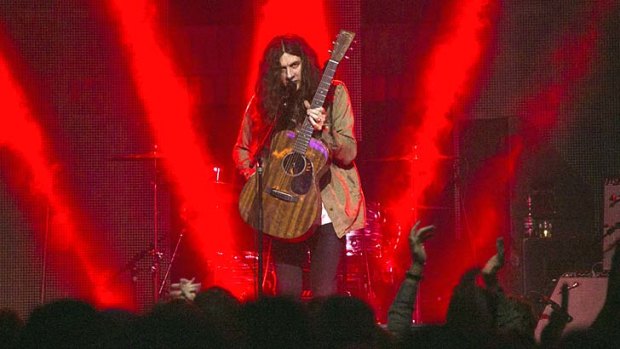Economy: Kurt Vile saved his words for his songs and kept banter to a minimum.
