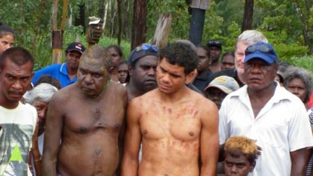 Hawthorn star Cyril Rioli (in yellow) at the funeral of his famous uncle Maurice Rioli in the remote island community of Garden Point on Melville Island.