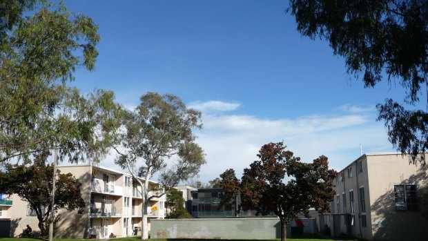 The Northbourne Avenue public housing flats are among the 11,500 ACT housing properties that racked up almost $3.5 million of damage to taxpayer-funded homes in 2014-15.