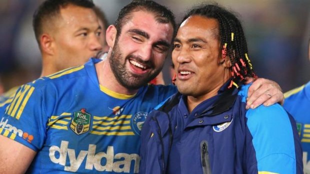 Fuifui Moimoi (right) of the Eels is farewelled after the Eels round 24 clash.