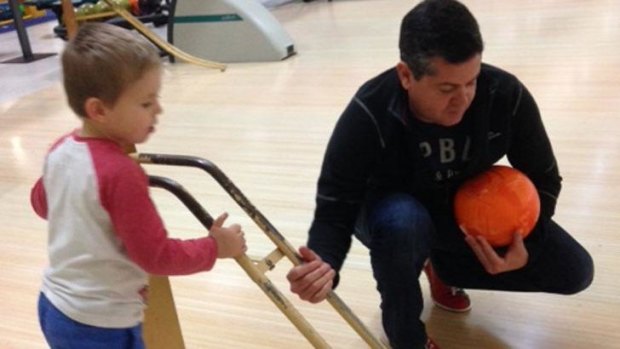 Nash and my brother Glenn at bowling.