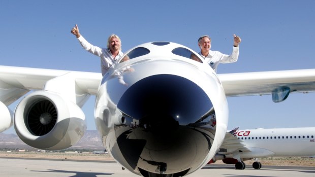 Richard Branson, left, in his concept craft, SpaceShipTwo. 