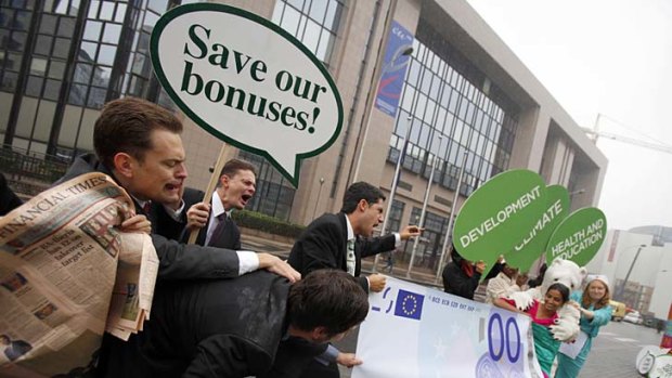 Widespread dissatisfaction ... protesters dressed as bankers take action over the issue of bankers' bonus payments.