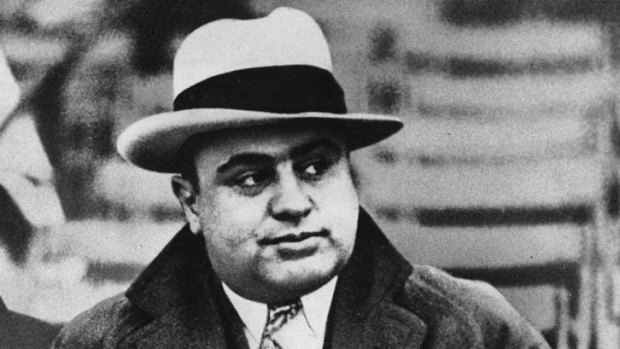 Notorious American gangster Al Capone, pictured at a football game in 1931.