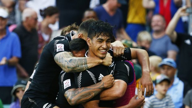 Rieko Ioane celebrates his tournament-winning try after the final siren in Sydney.