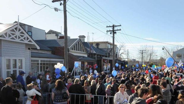 Fans queue out the front of the houses as an estimated 25,000 people flooded the streets of Richmond to see the finished house's of the television program 'The Block'.