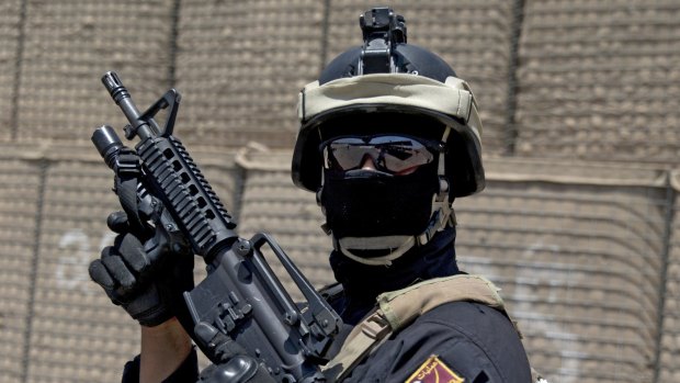 A member of the Iraqi Counter Terrorism Service participates in a training exercise.