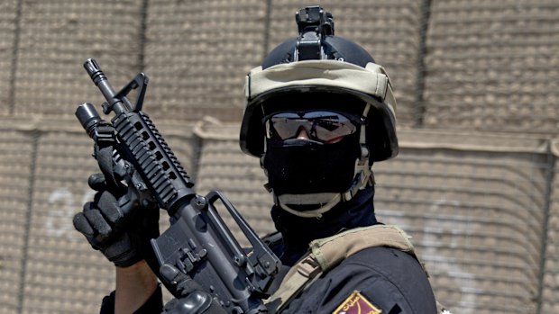 A member of the Iraqi Counter Terrorism Service participates in a training exercise.