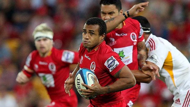 Claer run ... Will Genia of the Reds on the way to the tryline.