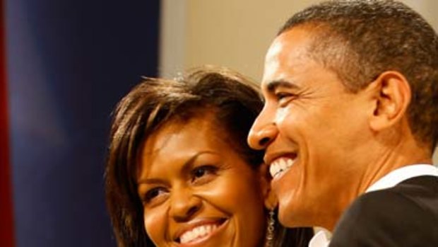 Earning well ...  US President Barack Obama and First Lady Michelle Obama.