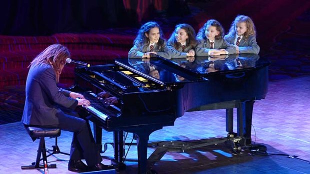 Tim Minchin performs onstage with the cast of <i>Matilda</i>.