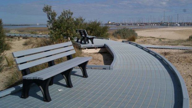 Bottom line:  Benches and boardwalk made from recovered plastics.