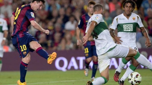 Double strike: Lionel Messi sinks Elche.