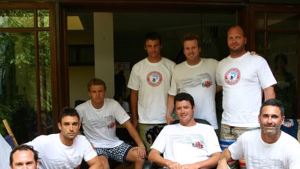 Eight of the nine surfers who escaped the tsunami.