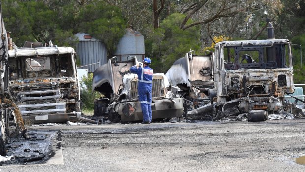 Eight trucks, including six fuel tankers, have been destroyed along with hundreds of LPG cylinders in a huge blaze behind a petrol station in Drysdale. 7th September 2017 Fairfax Media The Age news Picture by Joe Armao P