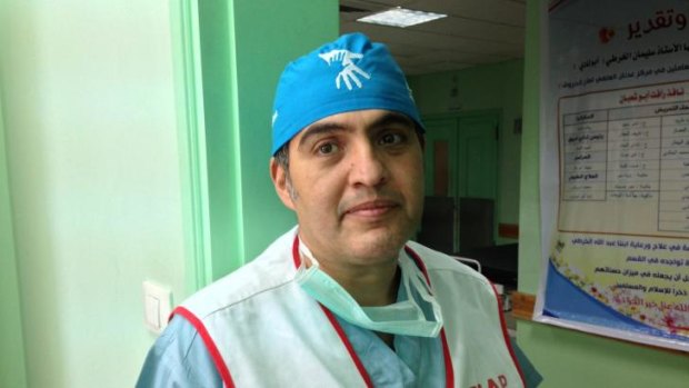 Volunteer: Dr Ghassan Abu-Sitta, a reconstructive surgeon, believes the injured boy needs to be moved to a better-equipped hosital. 