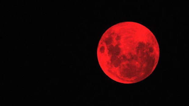 The moon may appear blood-red during tonight’s eclipse.