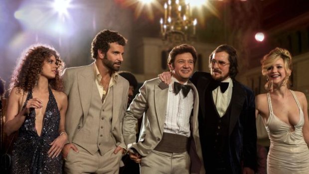 From left ... Amy Adams, Bradley Cooper, Jeremy Renner (only actor not nominated here), Christian Bale and Jennifer Lawrence in a scene from "American Hustle."