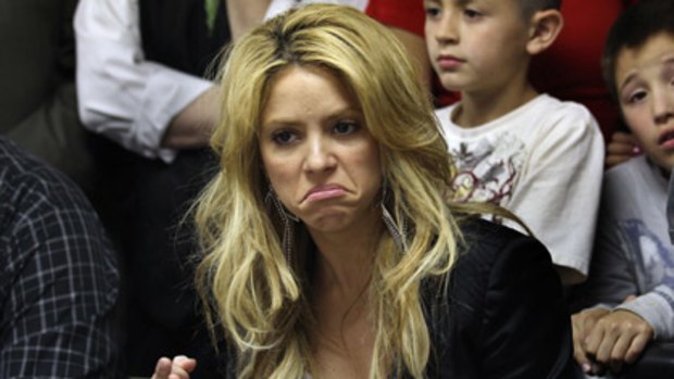 On side... popstar Shakira speaks at a community centre in Arizona in support of the Hispanic population.
