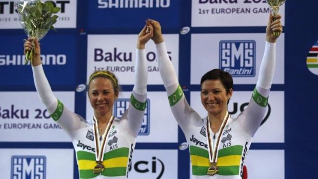 Australian team Kaarle Mcculloch, left, and Anna Meares pose with their medals.