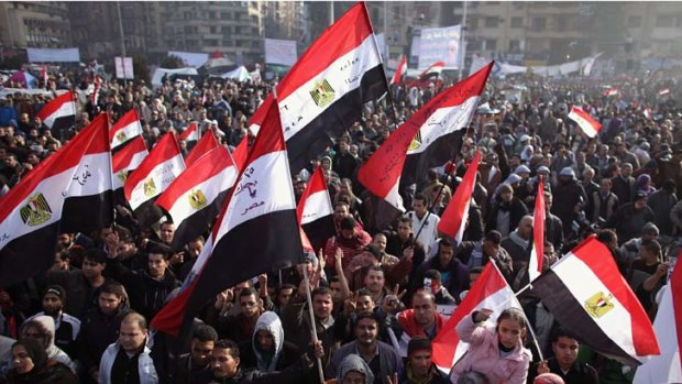 Egyptians gather in Tahrir Square to mark the one year anniversary of the revolution on January 25, 2012 in Cairo Egypt.