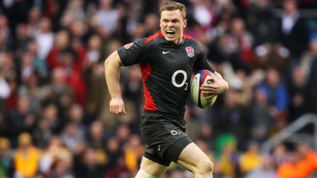 Streaking away . . . Chris Ashton of England sets sails for the Wallabies tryline.