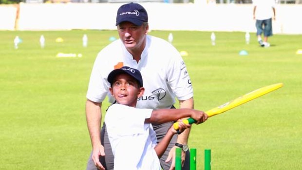 Does Andrew Hilditch have your number? ... a hard-hitting youngster catches Steve Waugh's eye at the Laureus Sport For Good Foundation coaching clinic in Rushcutters Bay yesterday.