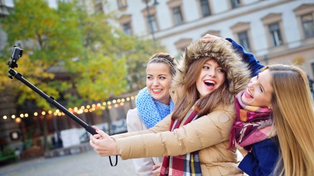 The selfie stick: A helpful tool or a sign of the coming apocalypse?