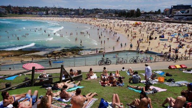Sydneysiders enjoy the warmer weather at North Bondi earlier this month.