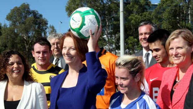 Spot the players &#8230; the Prime Minister, Julia Gillard, announces an $8 million grant for football at Parklea, backed by Labor politicians.
