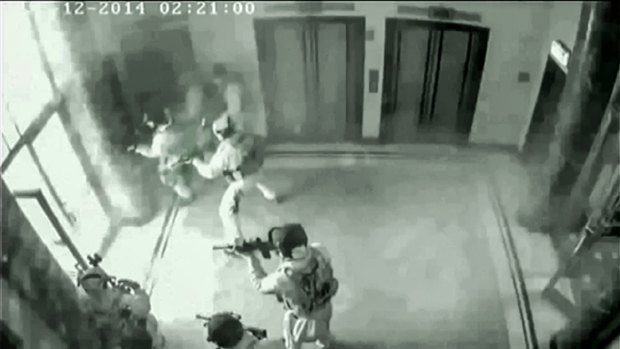 CCTV footage of police entering the cafe.