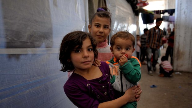 Young refugees from Syria and Iraq face the same hardships, regardless of race or religion.