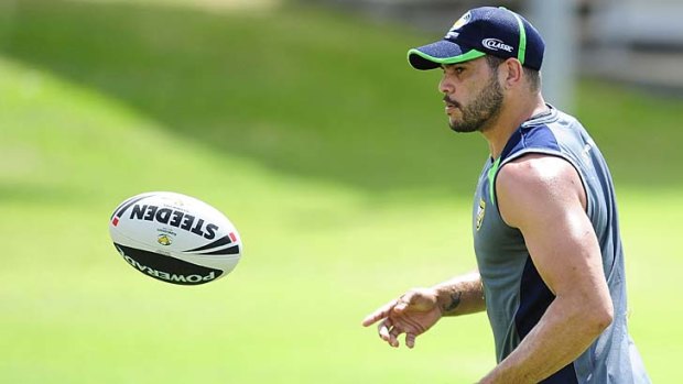 Ball watching ... Greg Inglis goes through his paces at training during the week in preparation for tomorrow's Test in Townsville.