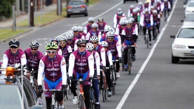 Charity trail: Tony Abbott leads cyclists in the annual Pollie Pedal.