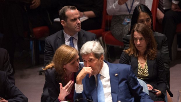 Then US Secretary of State John Kerry speaks with then US ambassador to the UN Samantha Power during a 2015 meeting on the conflict in Syria.