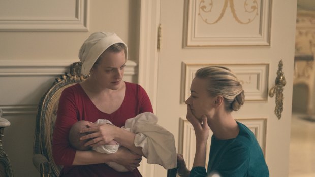 Offred the handmaid, played by Elizabeth Moss, and commander's wife Serena Joy, played by Yvonne Strahovski. Women in the fictional republic of Gilead have to play one of a limited number of proscribed roles.