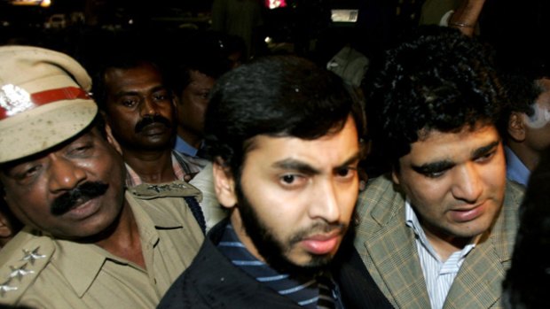Indian doctor Mohamed Haneef (centre) in Bangalore in July 2007 after terrorism charges against him were dropped.