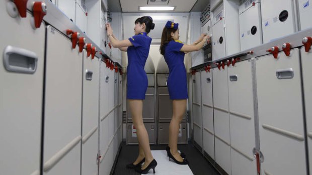 Skymark Airlines came under fire from the cabin crew's labour union, which said its flight attendants' super-short skirts - with a distinctively swinging sixties look - barely covers wearers' thighs.