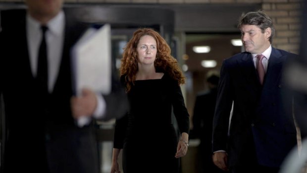 Rebekah Brooks, former head of News International, and Charlie Brooks, leave Southwark Crown Court in London.