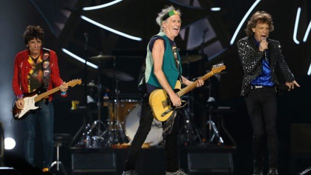 Satisfaction: From left, Ronnie Wood, Keith Richards and Mick Jagger on stage as the Rolling Stones perform live at Mt Smart Stadium, in Auckland, New Zealand.