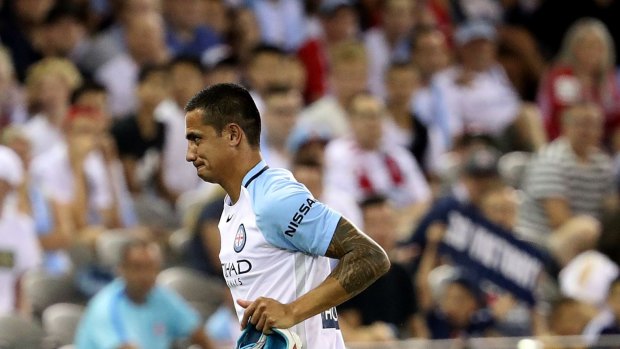 Tim Cahill heads off Etihad Stadium after being red-carded by Chris Beath.