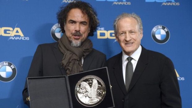 Michael Mann, right, with fellow director Alejandro Gonzalez Inarritu at the 67th annual Directors Guild of America Awards in Los Angeles, California February 7, 2015. 
