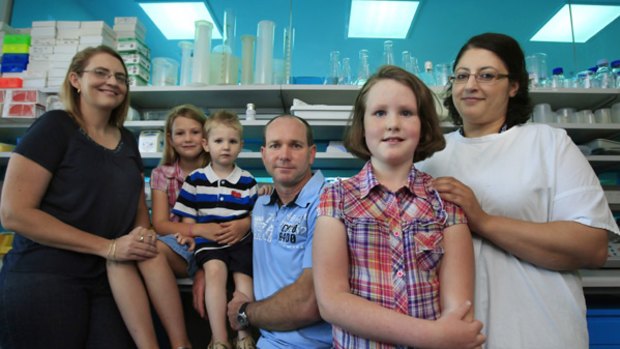 Cystic fibrosis sufferer Mikaela Brundell (second from right) with her family and ground-breaking  researcher Dr Faten Zaibak (right) at the Murdoch Children's Research Institute.