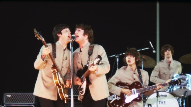 The Beatles, (from left) Paul McCartney, John Lennon, George Harrison and Ringo Starr, play at Shea Stadium, New York.