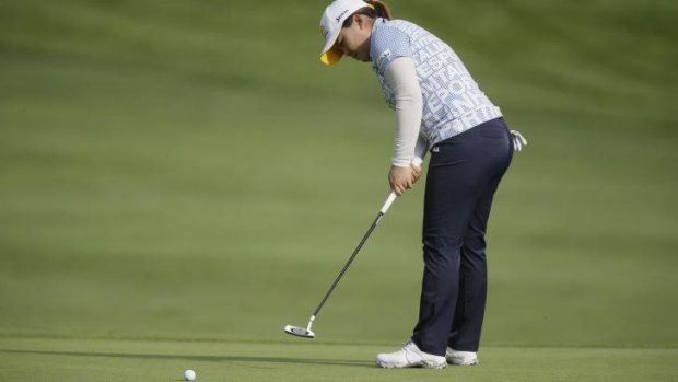 Hot putter: Inbee Park shows her class on the 15th green. 