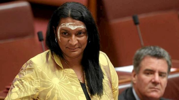 Emotional: Nova Peris, in a dress of gold silk and her face painted with ochre, makes her maiden speech in the Senate.