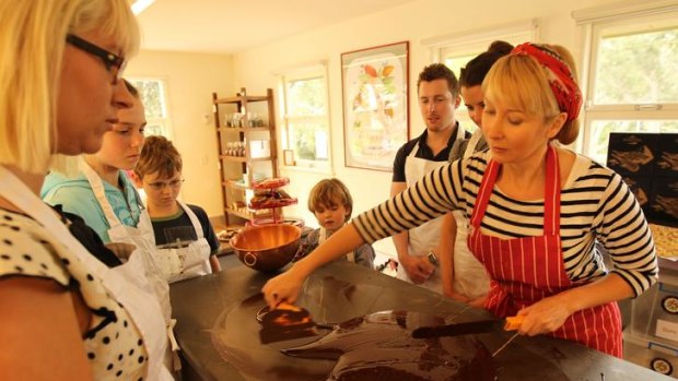 Sweet spread ... Rebecca Kerswell (right) teaches the art of chocolate making at her school.