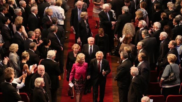 Former Australian prime ministers John Howard (back right) and Bob Hawke (front right) leave at the end of Gough Whitlam's memorial service.